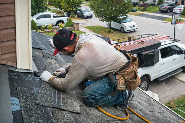 Professional Storm Damage Roof Repair technician working in West Swanzey, NH